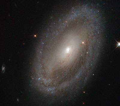 What type of galaxy is pictured below?  irregular  spiral lens ellipti