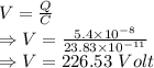V=\frac{Q}{C}\\\Rightarrow V=\frac{5.4\times 10^{-8}}{23.83\times 10^{-11}}\\\Rightarrow V=226.53\ Volt