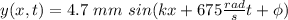y(x,t) = 4.7 \ mm  \ sin ( kx + 675 \frac{rad}{s} t + \phi)