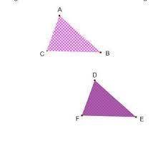 Triangle abc was transformed to create triangle def. 2 triangles are shown. triangle a b c has point