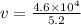 v = \frac{4.6 \times 10^4}{5.2}