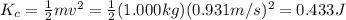 K_c = \frac{1}{2}mv^2=\frac{1}{2}(1.000 kg)(0.931 m/s)^2=0.433 J