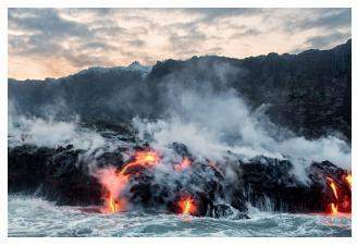 This image shows a volcanic eruption in hawaii with lava flowing into the sea.which statements best