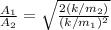 \frac{A_1}{A_2} = \sqrt{\frac{2(k/m_2)}{(k/m_1)^2}}
