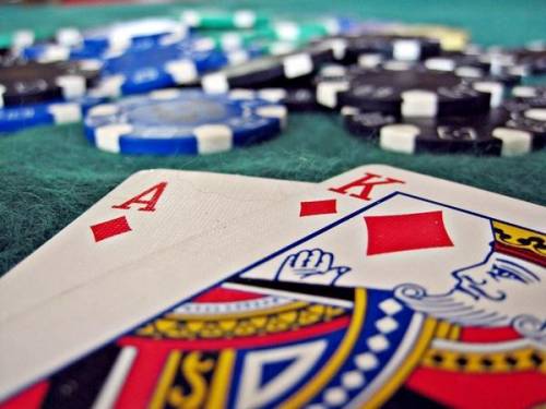 . In the game of blackjack as played in casinos in Las Vegas, Atlantic City, Niagara Falls, as well