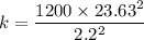 k = \dfrac{1200\times 23.63^2}{2.2^2}