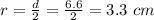 r = \frac{d}{2} = \frac{6.6}{2} = 3.3\ cm