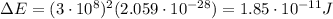 \Delta E=(3\cdot 10^8)^2 (2.059\cdot 10^{-28})=1.85\cdot 10^{-11}J