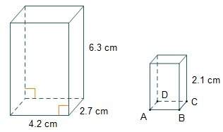 Hurr the rectangular prisms shown are similar. what is the area of the base of th