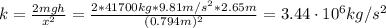 k = \frac{2mgh}{x^{2}} = \frac{2*41700 kg*9.81 m/s^{2}*2.65 m}{(0.794 m)^{2}} = 3.44 \cdot 10^{6} kg/s^{2}
