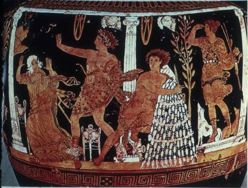 In a vase painting in our text, showing Orestes at Delphi being protected (sort of) by Apollo, we se