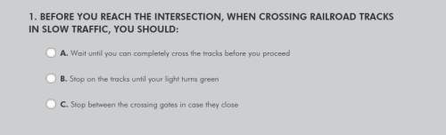 Before you reach the intersection, when crossing railroad tracks in slow traffic, you should: a. wa