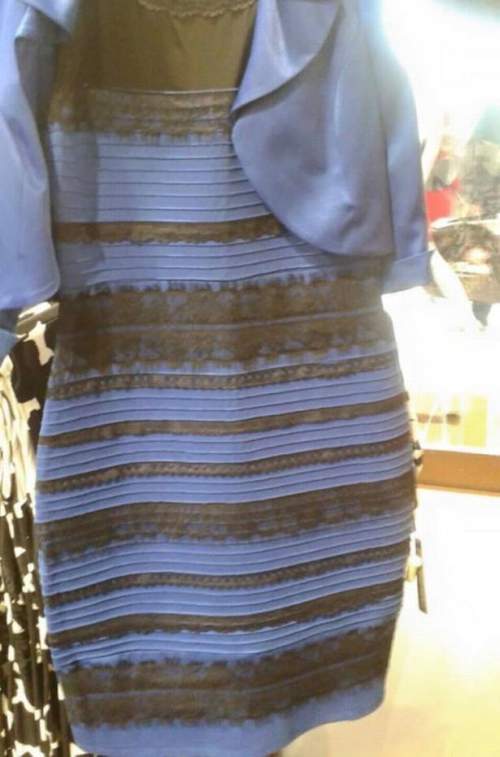 What color is the dress?  hi, i am having trouble understanding what color the dress is