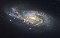 2. Determine the main structural difference between a spiral
galaxy and a elliptical galaxy.