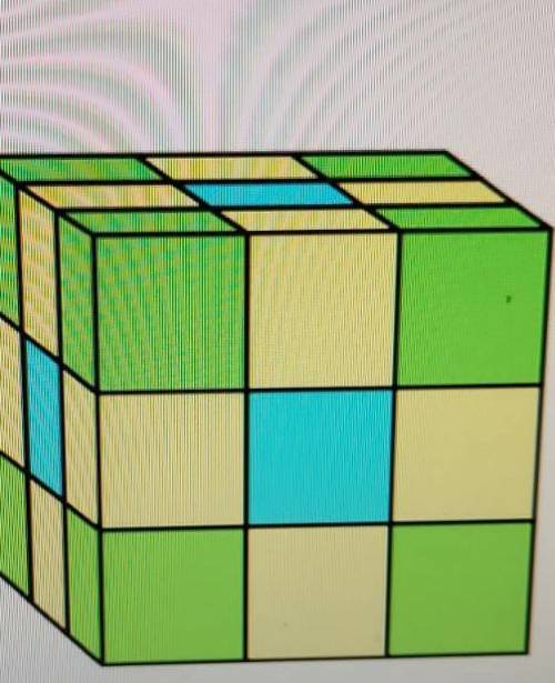 What fraction of the figures volume is made up of green cubes