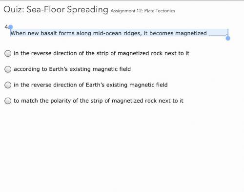When new basalt forms along mid-ocean ridges, it becomes magnetized _____.