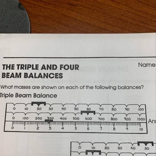 What are the masses shown on the triple beam below