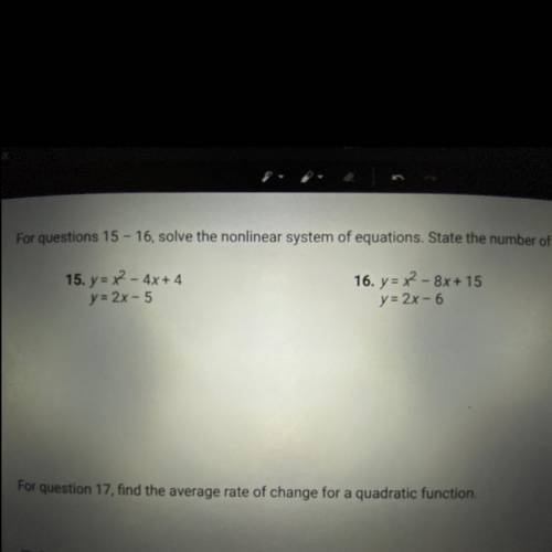 Solve the nonlinear system of equations. State the number of solutions.
