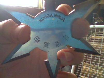 Can someone please tell me what this writing is in English on my shuriken, please?

(I also added