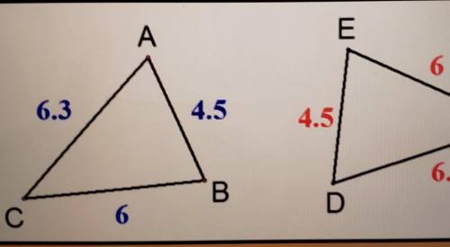 Carla and Barry are discussing the congruent triangles located in the diagram below. Carla believes