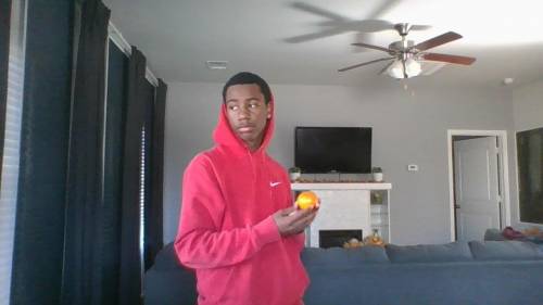 Posed with an orange....