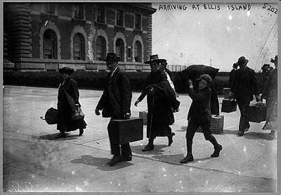 Help This photograph reveals that immigrants who arrived at Ellis Island

knew what to expect when