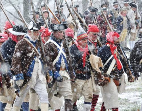 What does this photo suggest about American Revolution soldiers and their uniforms? Practice Write
