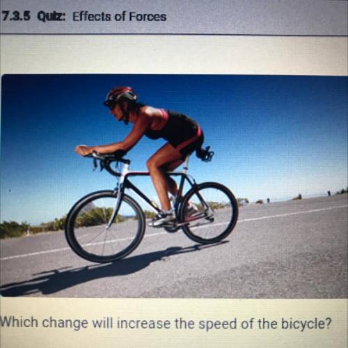 This woman is riding a bicycle down ahl at a constant speed and in a straight line.

Which change