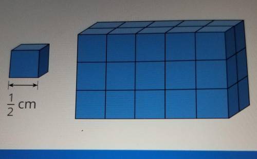 What is the volume of the rectangular prism? Type the answer in the boxes below. (put in a mix numb