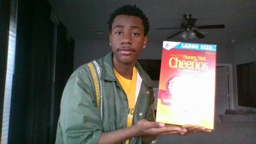 POSING WITH CHEERIOS...because i'm crazy...and hungry (but sadly we don't have milk) :') nOw lIsTEn