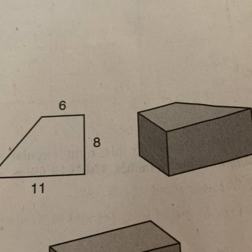 The two dimensional drawing shows a base of a White solid that is 9 mm tall. Find the volume of the