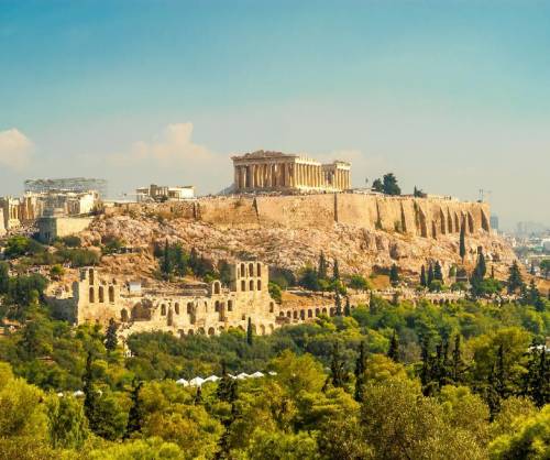 This photograph shows a famous site in ancient Greek architecture.

A remains of a city with a tem
