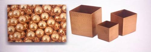 Compare the densities of the copper spheres to the copper cubes.