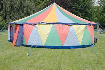 Which geometric solids would model the tent?

a tent in which the bottom portion is circle that ex