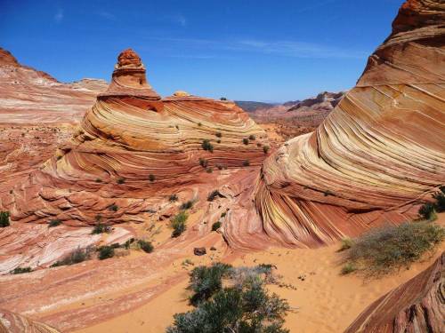 Erosion is the geological process in which earth materials are worn away and transported. Describe