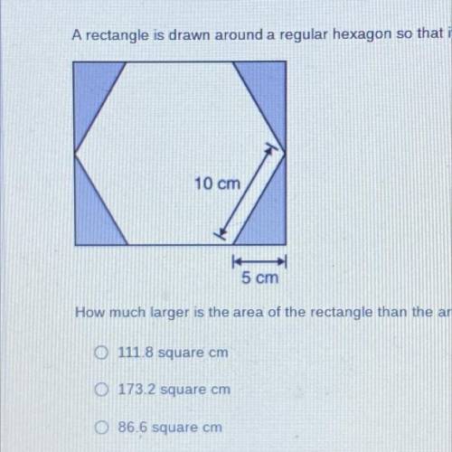 A rectangle is drawn around a regular hexagon so that it forms four congruent right triangles in th