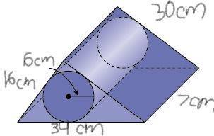 Find the total surface area of the composite figure. The figure is a triangular prism with a cylind