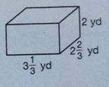 What is the volume of the prism?

How many cubes with a side length of 13 yard fit into the rectan