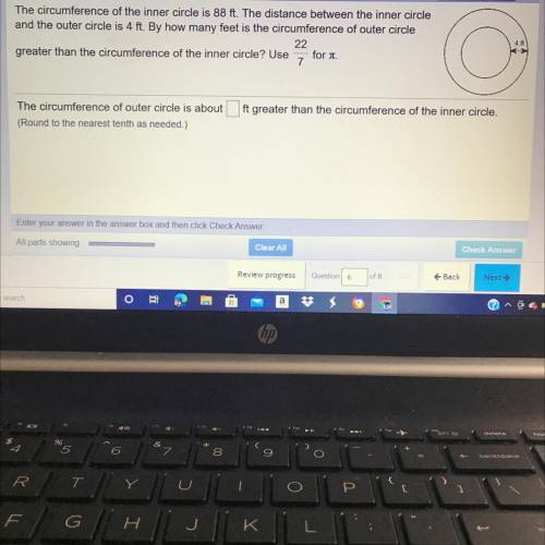 The circumference of the inner circle is 88 ft. The distance between the inner circle and the outer