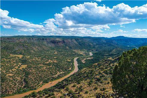 The Rio Grande River separates Mexico from Texas.

What most likely created the riverbed?
A.glacie
