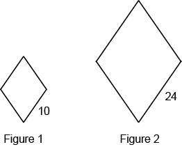 PLEASE HELP

Figure 1 is dilated to get Figure 2.
What is the scale factor?
Enter your ans