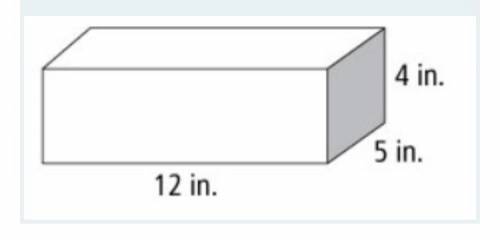 What is the volume of the shoebox with the dimensions shown in the figure?