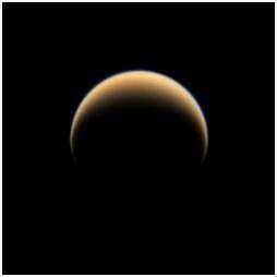 Saturn's largest moon is Titan, shown below.

Which of the following statements about Earth and Ti