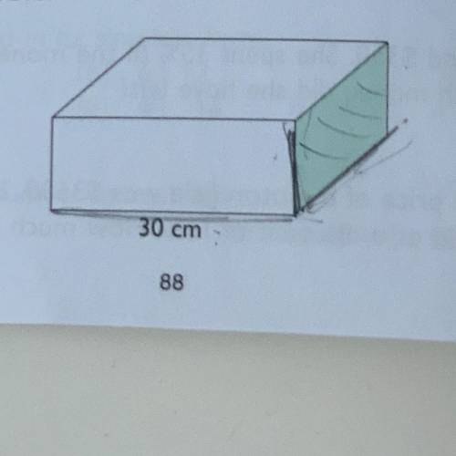 The area of the shaded face of the cuboid is 400 cm? Find the
volume of the cuboid.