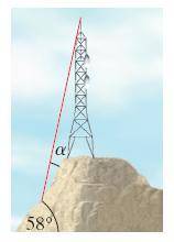 A communications tower is located at the top of a steep hill, as shown. The angle of inclination of